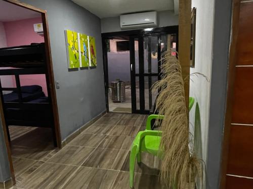 a room with a row of ropes on the wall at CASA APARTAMENTO COMPLETO THOMY - Coveñas in Coveñas