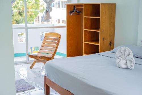 Postel nebo postele na pokoji v ubytování Hotel Gamito