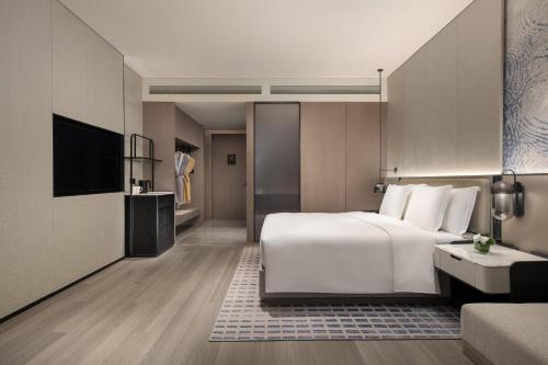 Μια τηλεόραση ή/και κέντρο ψυχαγωγίας στο Crowne Plaza Jingmen by IHG