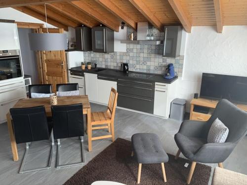 Η κουζίνα ή μικρή κουζίνα στο Chalet St Lambertus Apartment A