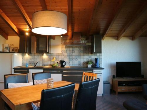 Η κουζίνα ή μικρή κουζίνα στο Chalet St Lambertus Apartment A