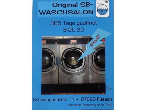 a flyer for a washer and dryer at Villa Alpenblick Comfortable holiday residence in Füssen