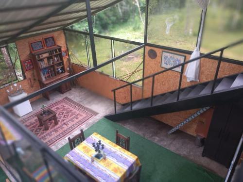 an overhead view of a house with a view of a room at Glasshouse with river in San Rafael