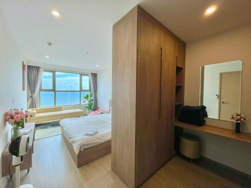 Postel nebo postele na pokoji v ubytování The Sóng Apartment 5 Stars Vung Tau - Căn Hộ Du Lịch Biển 5 Sao Vũng Tàu - MINH TOẢN's Homestay