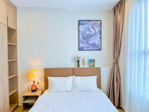 Postel nebo postele na pokoji v ubytování The Sóng Apartment 5 Stars Vung Tau - Căn Hộ Du Lịch Biển 5 Sao Vũng Tàu - MINH TOẢN's Homestay