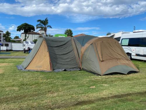 a tent sitting on the grass in a field at Nobby Beach Holiday Village in Gold Coast