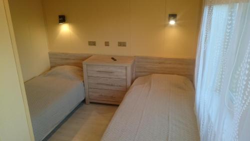 Ένα ή περισσότερα κρεβάτια σε δωμάτιο στο Vetesina