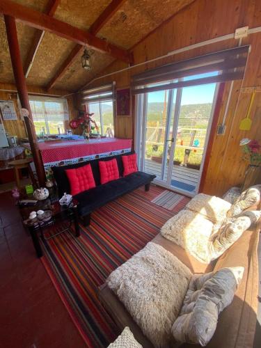 Χώρος καθιστικού στο Cabaña Familiar en Pucatrihue