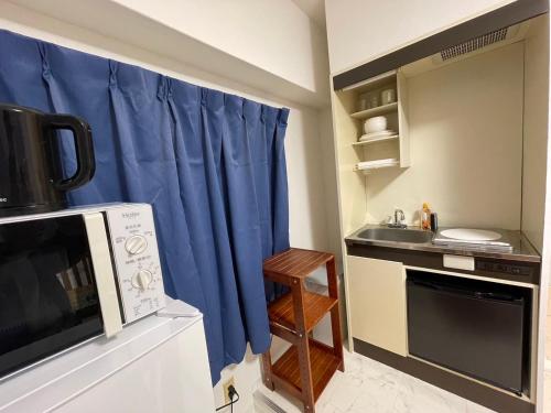 Η κουζίνα ή μικρή κουζίνα στο A&C STAY Shin-Osaka