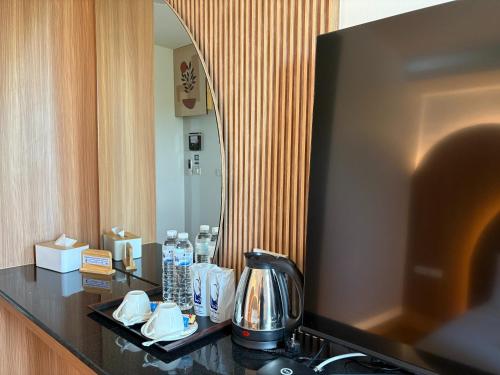 Kuchyň nebo kuchyňský kout v ubytování Chom Chiang Rai Hotel