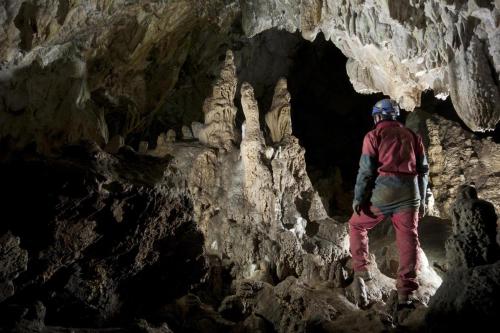 a man standing inside of a cave at Palazzo Gentilizio de Maffutiis in Auletta
