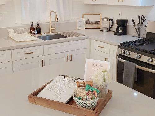 a kitchen with a tray of food on a counter at Centrally Located Charming LA Home with Food Scenes in Monterey Park