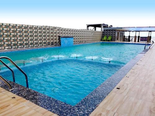 Bazén v ubytování Sonargaon Beach Resort nebo v jeho okolí