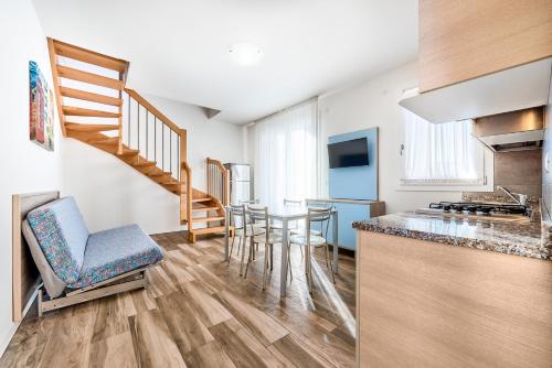 Kuchyň nebo kuchyňský kout v ubytování Jesolo Village Beach House - Host Solution