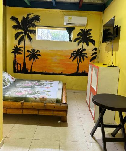 Televízia a/alebo spoločenská miestnosť v ubytovaní Hostal Bambumar