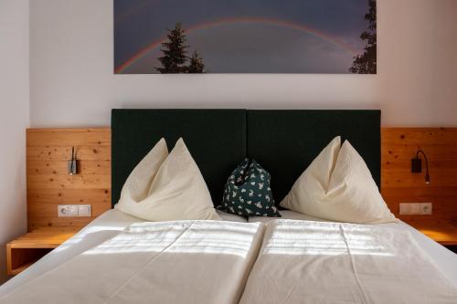 Postel nebo postele na pokoji v ubytování Hirschenhof