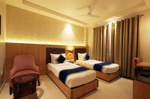 The Elegance Hotelにあるベッド