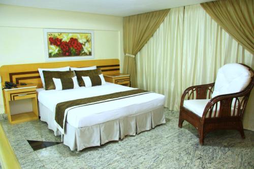 Hotel Riviera D Amazonia Belem Ananindeua tesisinde bir odada yatak veya yataklar