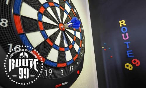 a dart board with the words roulette on it at 【芦ノ湖徒歩10分＆バス停1分】一棟貸切最大14人 大人數BBQ可能 パーティ 『ROUTE99』 in Moto-hakone