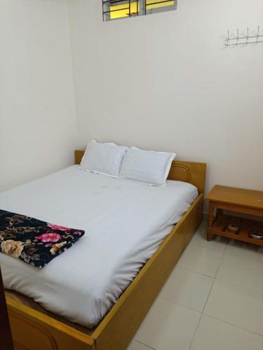 Postel nebo postele na pokoji v ubytování Hotel Inn Chittagong