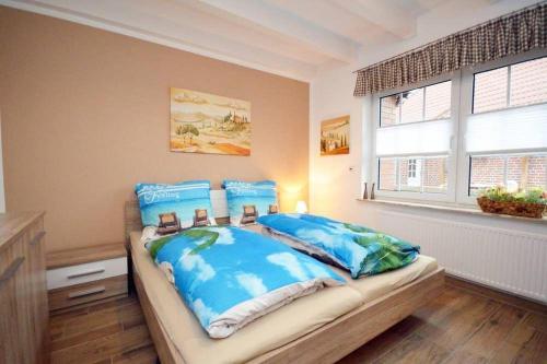 Postel nebo postele na pokoji v ubytování Ferienhaus-Moewenschiss