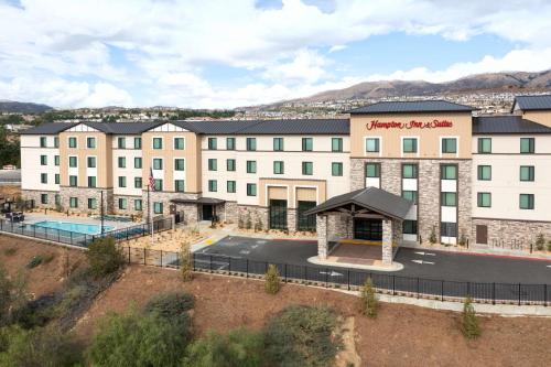 an aerial view of a hotel with a pool at Hampton Inn & Suites Porter Ranch Los Angeles in Deer Lake Highlands