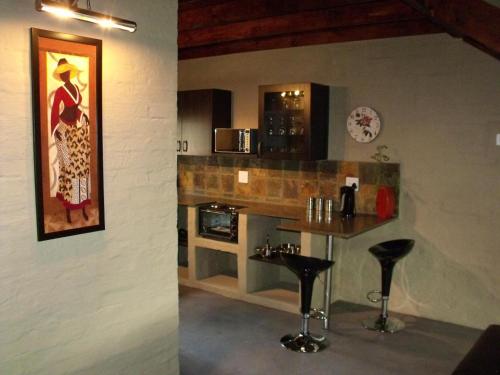 Una cocina o cocineta en Commalong Lodge