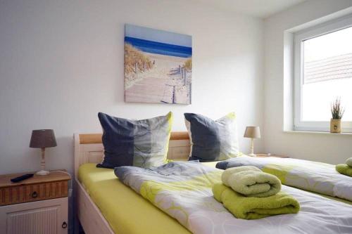 Ένα ή περισσότερα κρεβάτια σε δωμάτιο στο Seestern-7