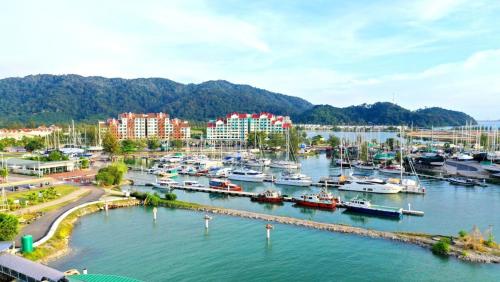 a group of boats docked in a harbor at D'Ocean Marina Laguna Resort by Manhattan Group in Lumut