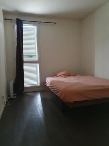 Postel nebo postele na pokoji v ubytování Chambre 2
