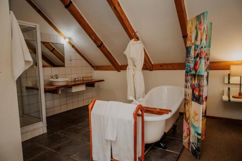 Ванная комната в Aan de Oever Guesthouse