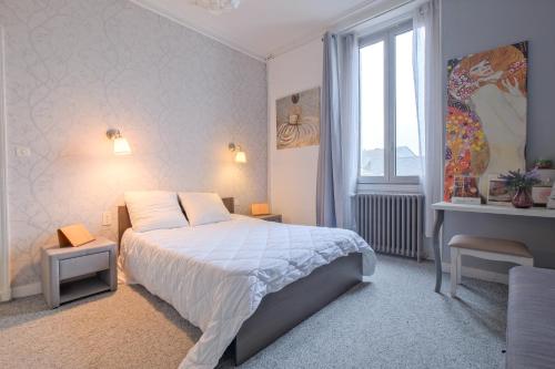 Posteľ alebo postele v izbe v ubytovaní Miraflores, appartement en ville