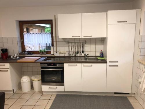 Η κουζίνα ή μικρή κουζίνα στο Ferienwohnung nähe Bodensee