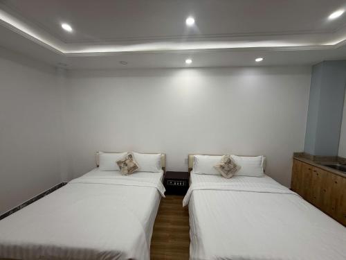 Katil atau katil-katil dalam bilik di Atus Boutique Home