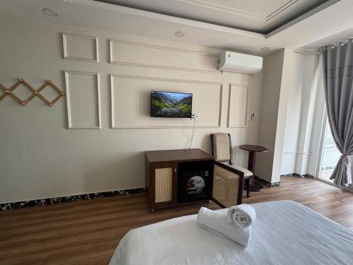 Katil atau katil-katil dalam bilik di Atus Boutique Home
