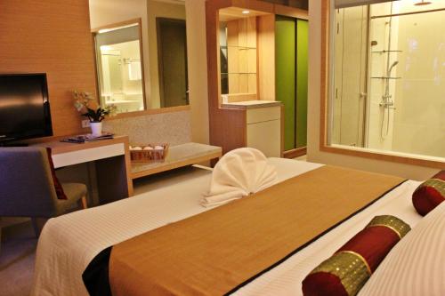 
A bed or beds in a room at Mount Sea Resort
