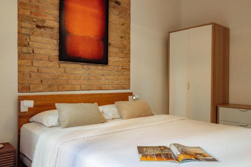 Ένα ή περισσότερα κρεβάτια σε δωμάτιο στο Design Apartments by Olala Homes