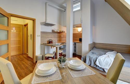 Kuchyň nebo kuchyňský kout v ubytování Apartmány Třeboň BÍLÝ BERÁNEK