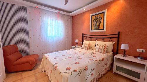 Ένα ή περισσότερα κρεβάτια σε δωμάτιο στο La Finquita Home