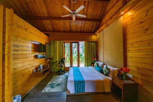 Postel nebo postele na pokoji v ubytování Sinclairs Retreat Kalimpong