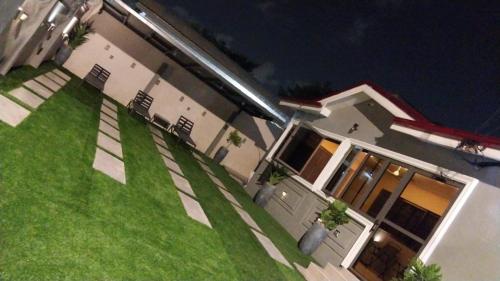 Garden sa labas ng Ghanastays
