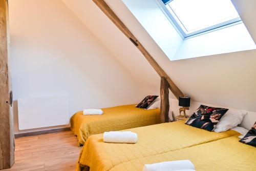 Postel nebo postele na pokoji v ubytování Les Longères de Montfranc - Chambres d'hôtes