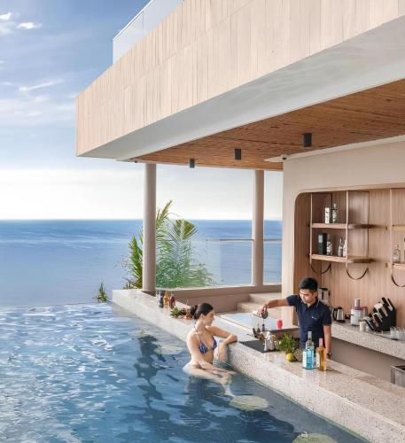 a rendering of a villa with a kitchen in the swimming pool at Mandala Pearl Azure Retreat in Ấp Nhơn Long