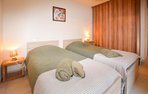 Cama o camas de una habitación en Beautiful Home In Sagone With Kitchen