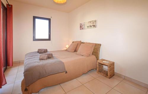 Cama o camas de una habitación en Beautiful Home In Sagone With Kitchen
