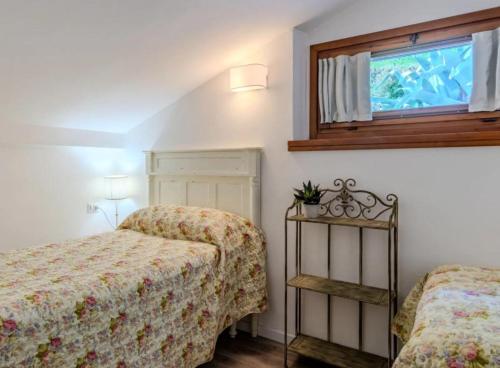Ένα ή περισσότερα κρεβάτια σε δωμάτιο στο Luxury Residence La Pianca - Pool and Terrace Lake View