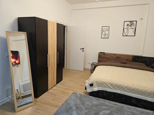 Postel nebo postele na pokoji v ubytování Tranquil Studio Apartment
