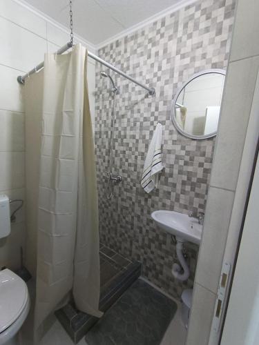 Ένα μπάνιο στο Apartmani Villa Deleon Bjelasnica