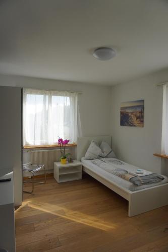 a bedroom with a large bed in a room at good bed wynau in Wynau