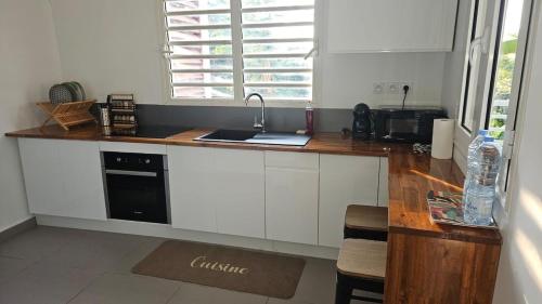 Una cocina o cocineta en Le cocouning